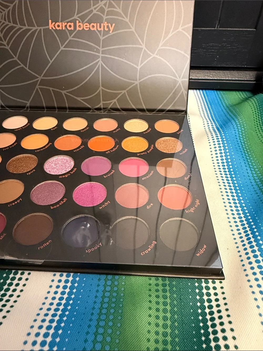 Kara Beauty Black Eyeshadow Palette – Coral Logo Accent
